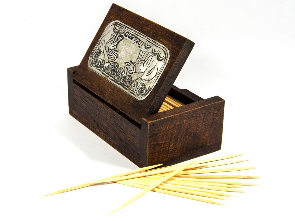 Ancient wooden box of toothpicks