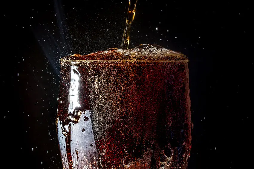fizzy glass of ice cold coca-cola